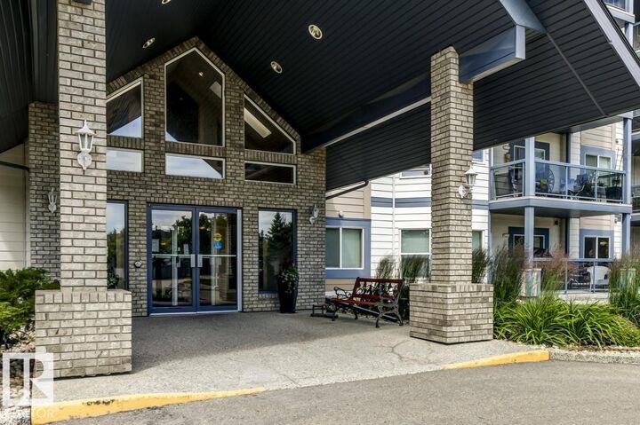 Property Photo:  100 Foxhaven Drive 318  AB T8A 6B6 