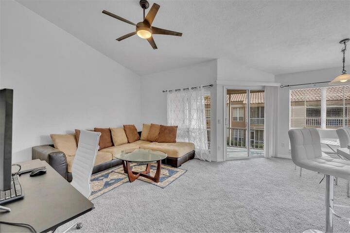 Property Photo:  4806 Normandy Place E-203  FL 32811 