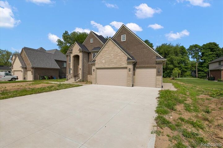 Property Photo:  56350 Willow Creek Boulevard  MI 48316 