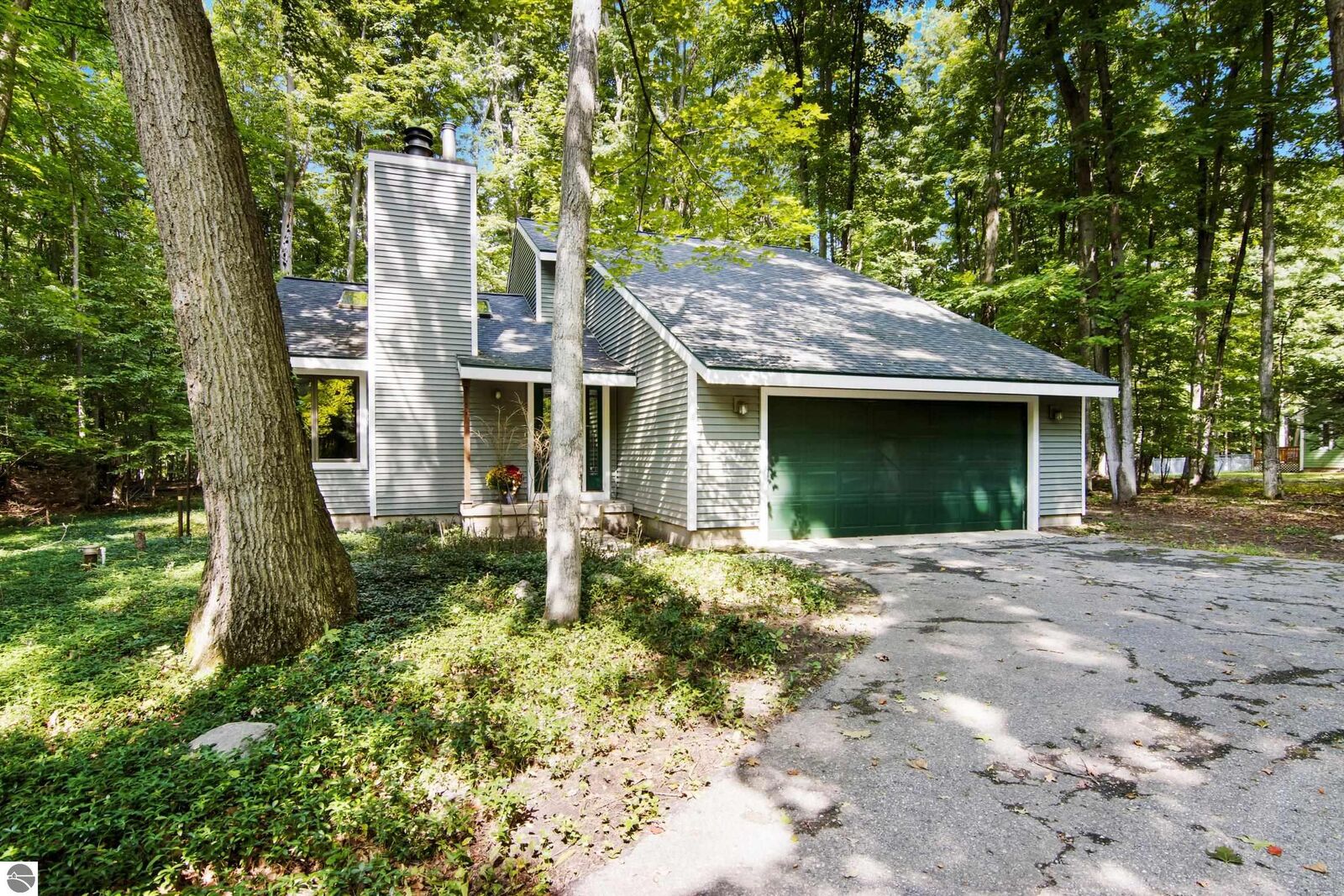 Property Photo:  2345 Kenona Woods Drive  MI 49696 