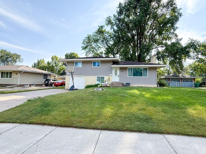 Property Photo:  3113 65th Avenue N  MN 55429 