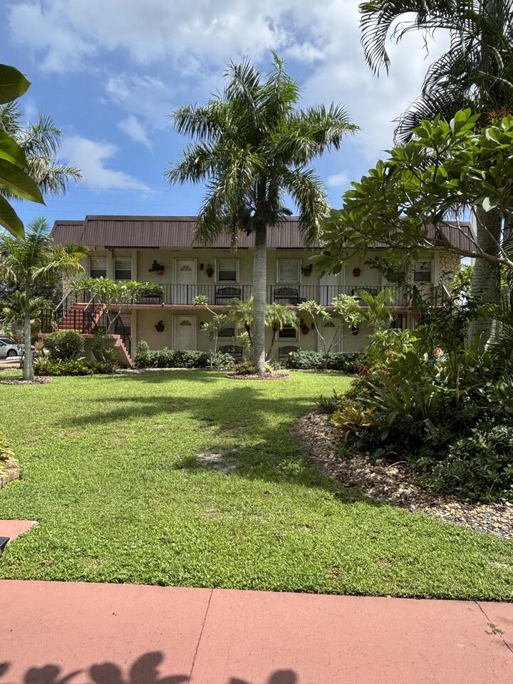 Property Photo:  400 Fern Street 1-C  FL 33458 