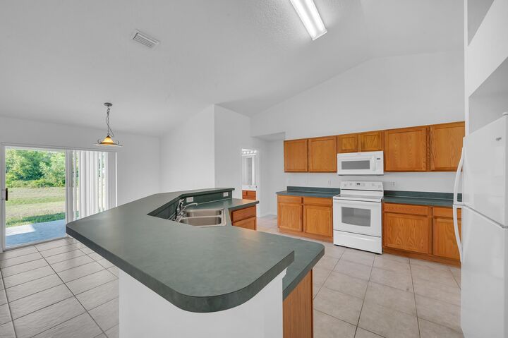 Property Photo: 446 SW South Quick Circle FL 34953