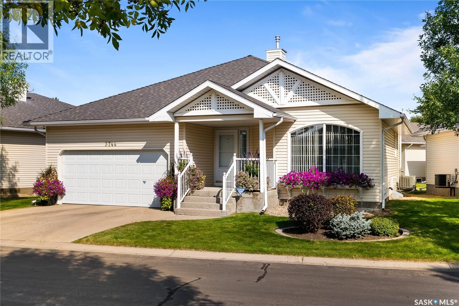 Property Photo:  3744 Queens Gate  SK S4S 7J1 