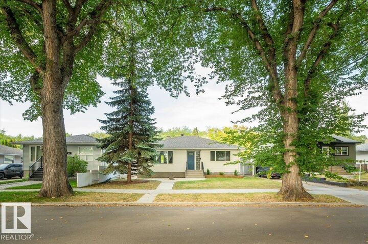 Property Photo:  11920 51 Street NW  AB T5W 3G4 