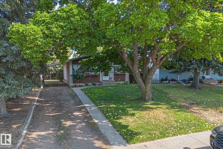 Property Photo:  13515 124 Street NW  AB T5L 0R7 