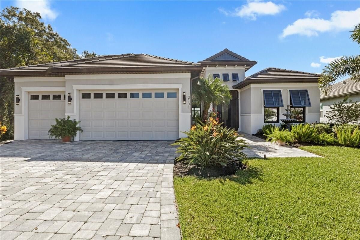 Property Photo:  12131 Bald Cypress Cove  FL 34219 