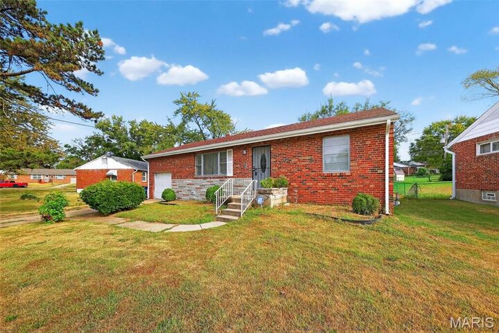 Property Photo:  9219 Sundown Drive  MO 63136 
