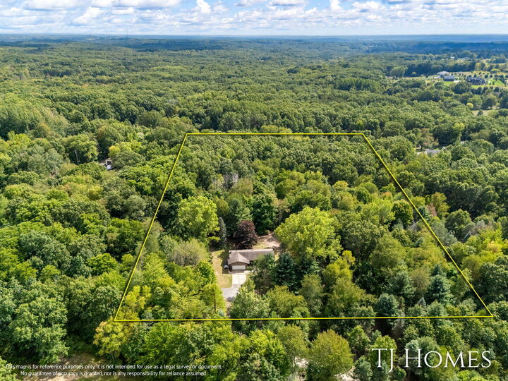 Property Photo:  6654 5 Mile Road NE  MI 49301 