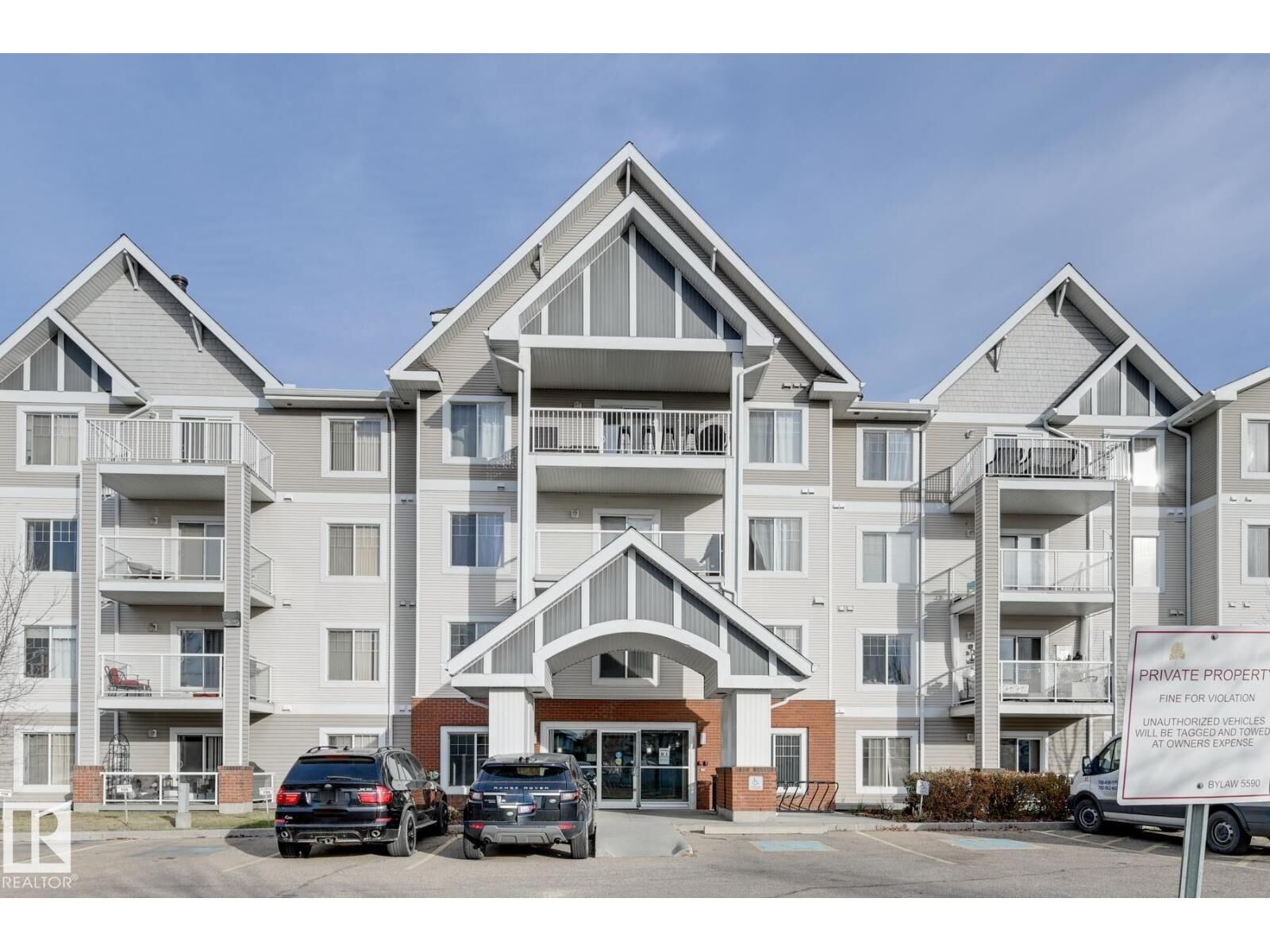 Property Photo:  #215 13830 150 Av NW  AB T6V 1X2 