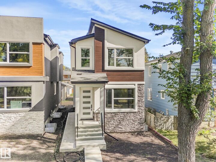 Property Photo:  10963 129 Street NW  AB T5M 0Y2 