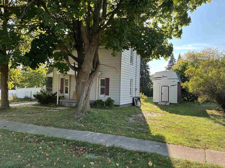 Property Photo:  415 Dimmick Street  MI 48867 