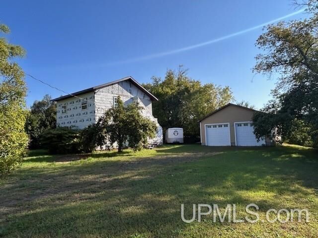Property Photo:  46882 Naumkeg Street  MI 49905 