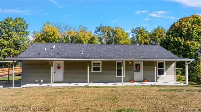 Property Photo:  806 Davis Lake Road  MI 48446 