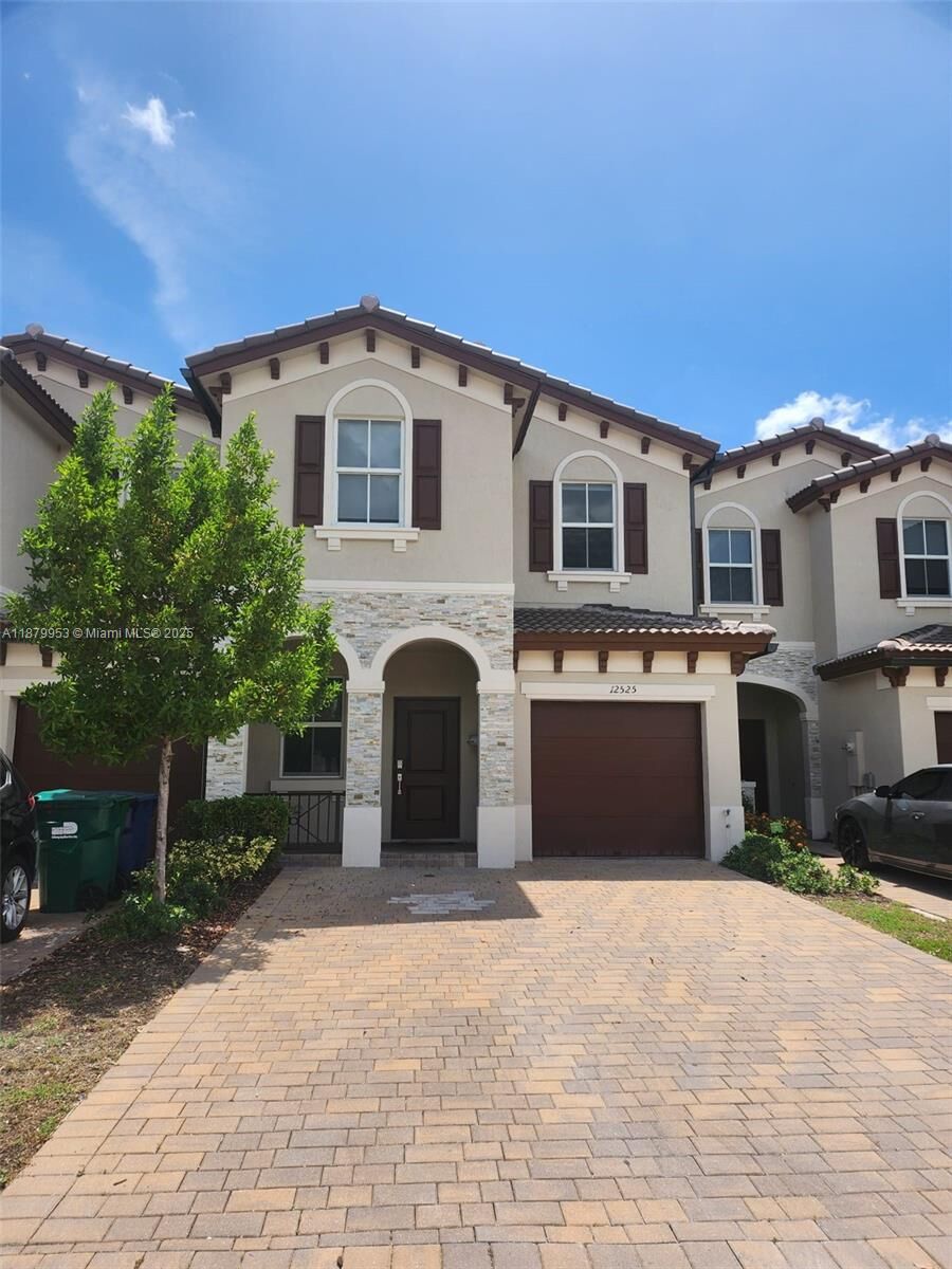 Property Photo:  12525 NW 23rd Pl 12525  FL 33167 