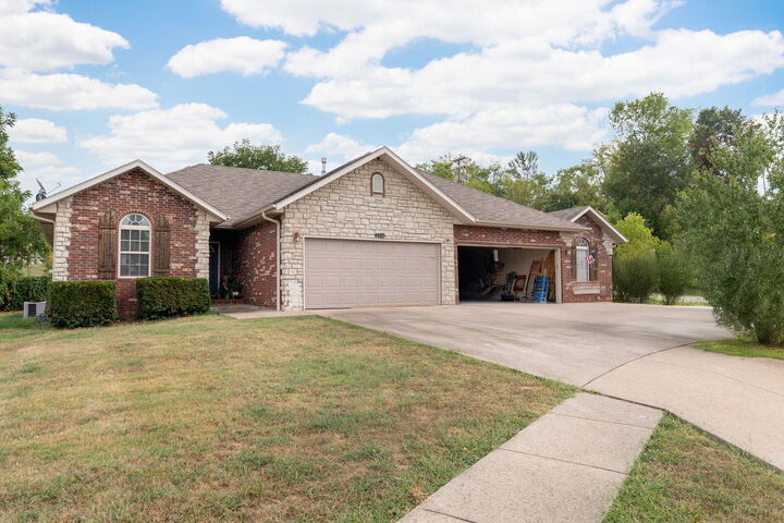 Property Photo:  1432-1434 S Treetop Court  MO 65721 