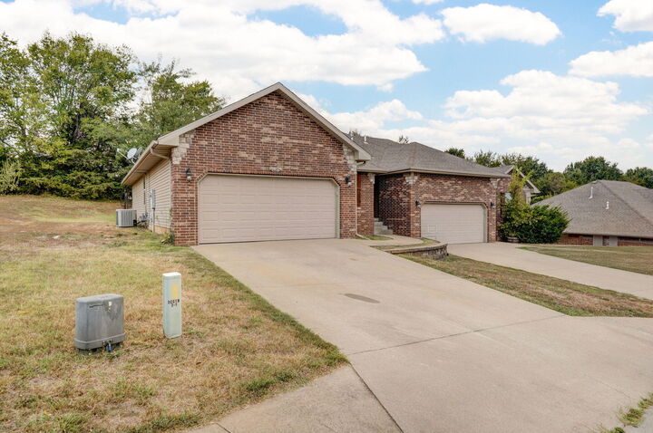 Property Photo:  1433-1435 S Atlas Court  MO 65721 