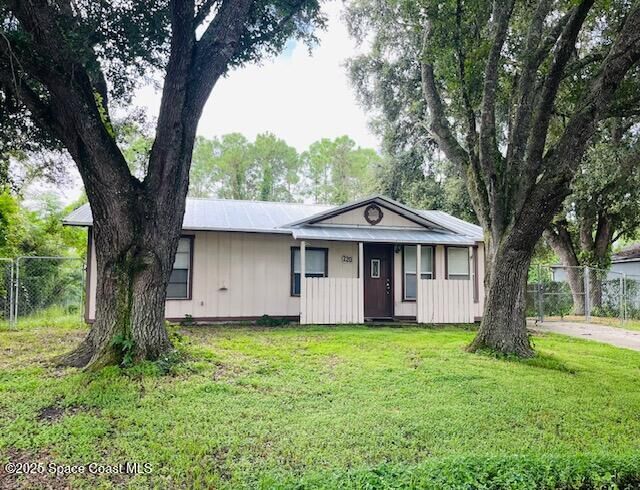 Property Photo: 220 Ensenada Street SE FL 32909