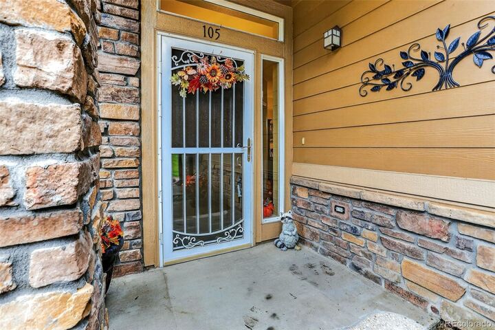 Property Photo: 8779 S Kipling Way 105 CO 80127