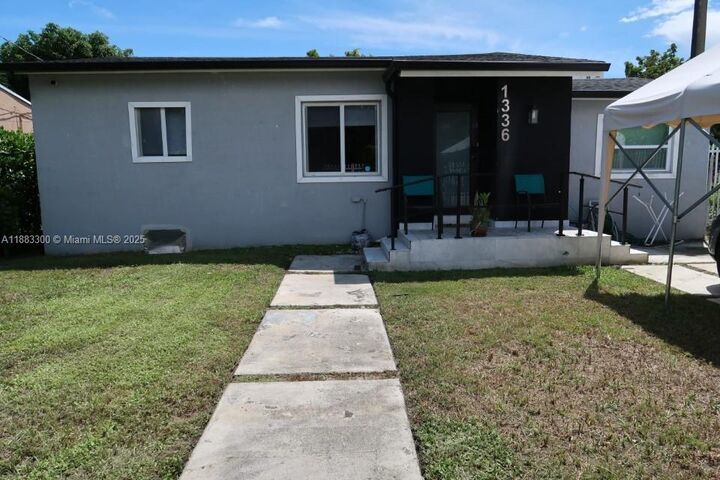 Property Photo:  1336 NW 38th St 2  FL 33142 