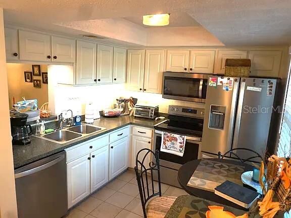 Property Photo:  841 Patricia Avenue 206  FL 34698 