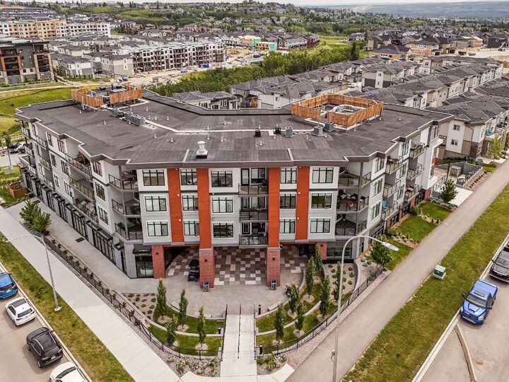 Property Photo:  205 Spring Creek Common SW 403  AB T3H 6H4 