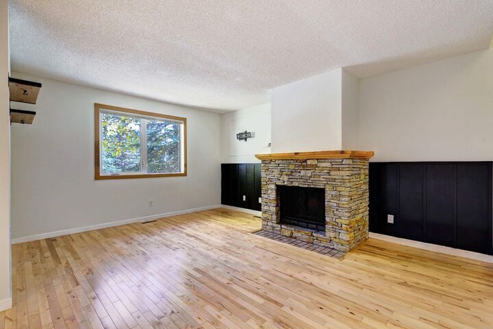 Property Photo:  200 Three Sisters Drive 105  AB T1W 2M1 