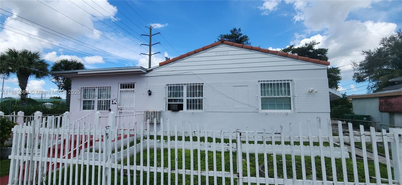 Property Photo: 405 NW 64th St FL 33150