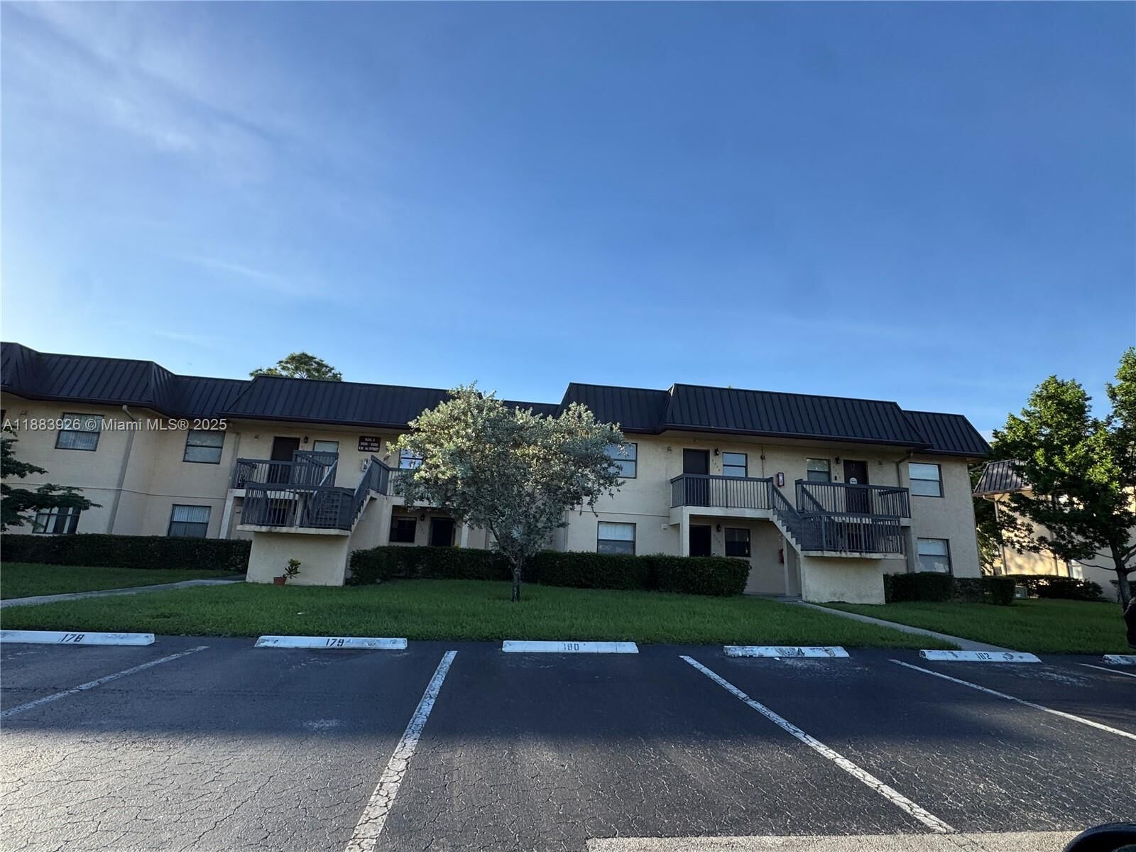 Property Photo: 142 NW 91st Ave 104 FL 33024