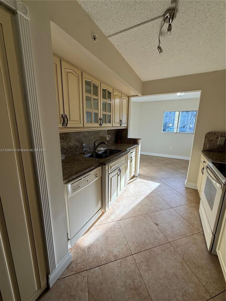 Property Photo: 900 SW 142nd Ave 101L FL 33027
