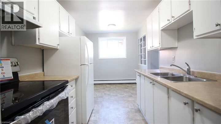 Property Photo:  527 Parkside Drive 12  ON N2L 4X7 