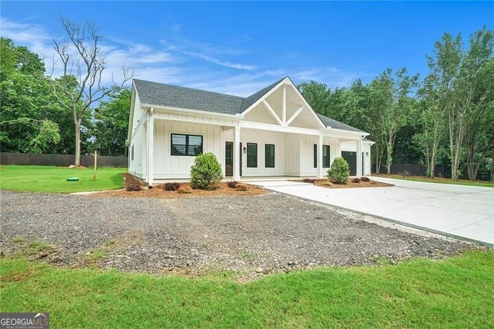 Property Photo:  4824 SE Highway 20  GA 30013 