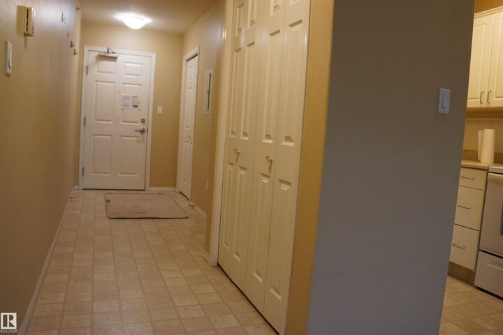 Property Photo: 8802 Southfort Drive 403 AB T8L 4R6