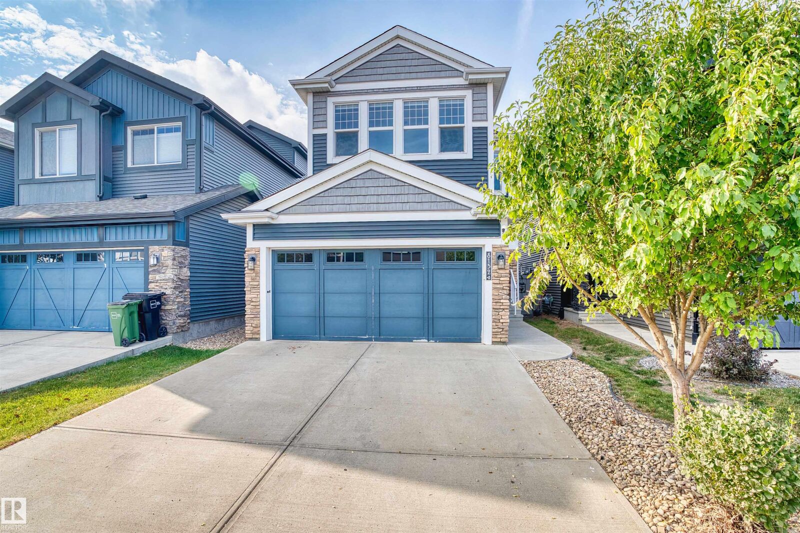 Property Photo:  8132 225 Street NW  AB T5T 7G6 
