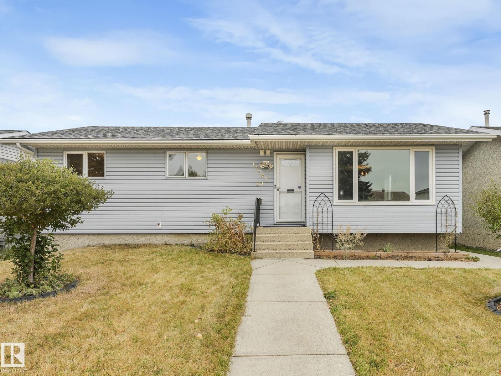 Property Photo:  13547 24 Street NW  AB T5A 3S7