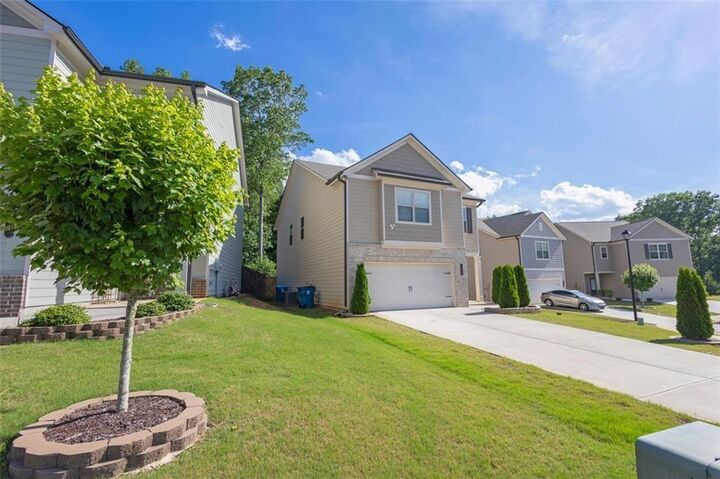 Property Photo:  104 Auburn Crossing Way  GA 30011 