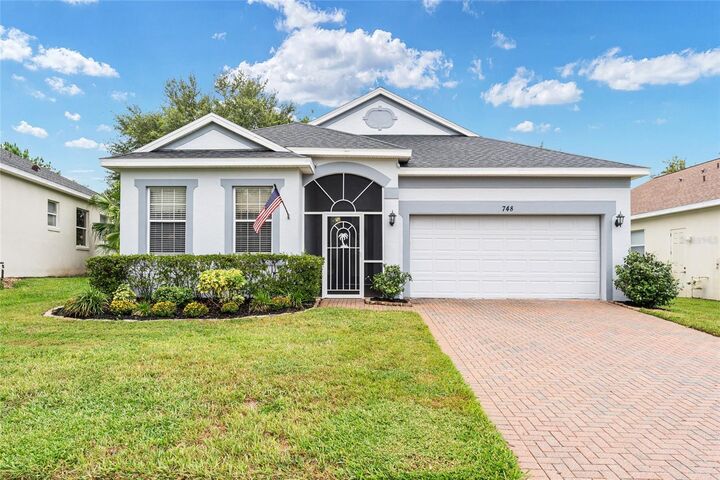 Property Photo:  748 Summit Greens Boulevard  FL 34711 