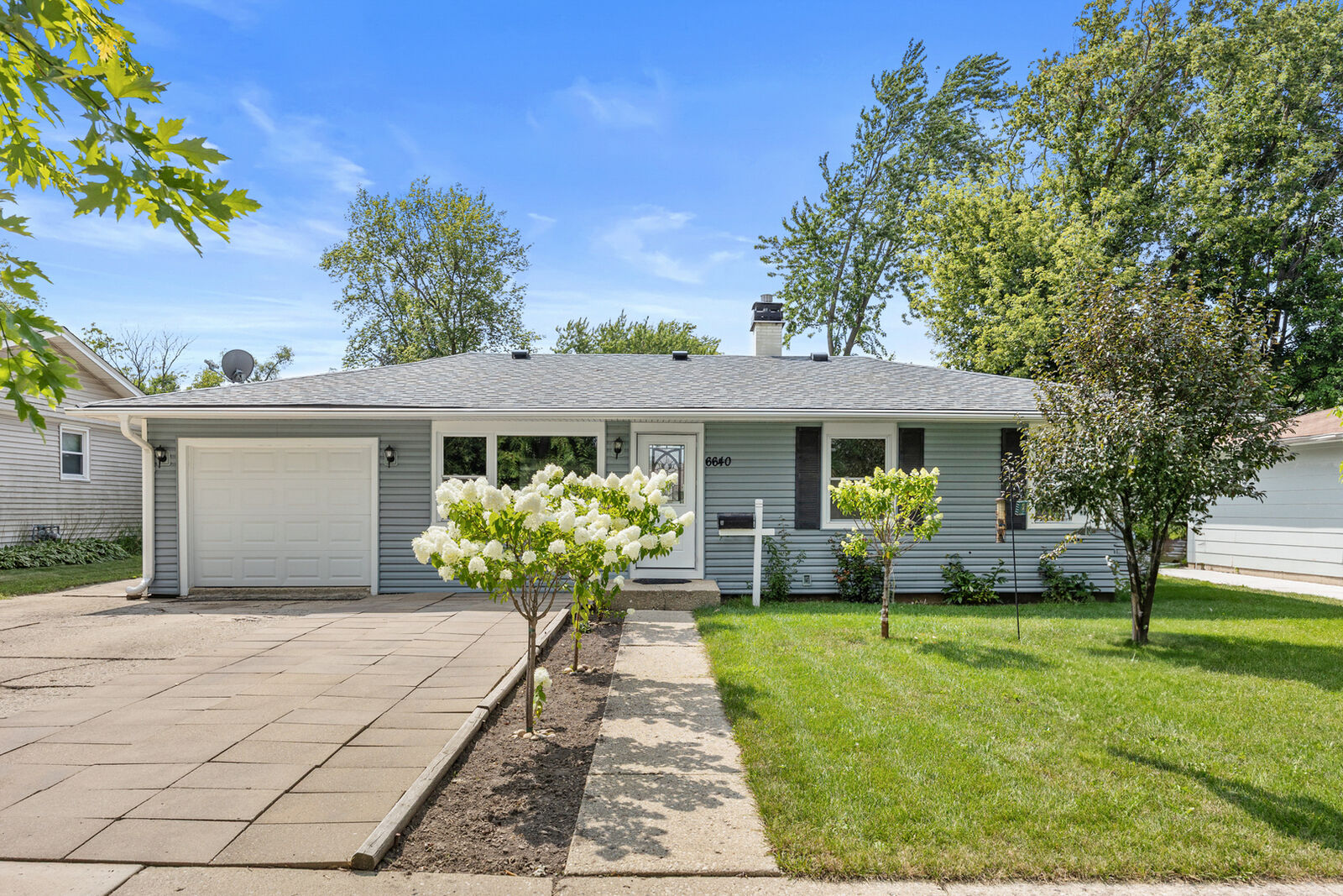 Property Photo:  6640 Peach Tree Street  IL 60133 