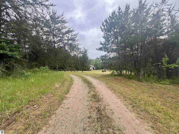 Property Photo:  8536 E 5 Mile Road  MI 49656