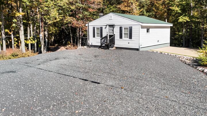 Property Photo:  400 Route 11  NH 03855