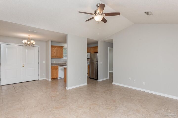 Property Photo: 5715 Divot Ln FL 32570