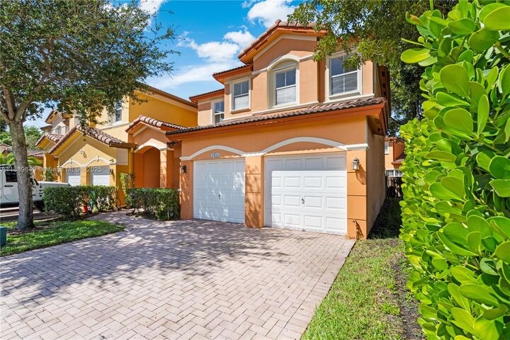 Property Photo:  8450 NW 113th Psge  FL 33178 