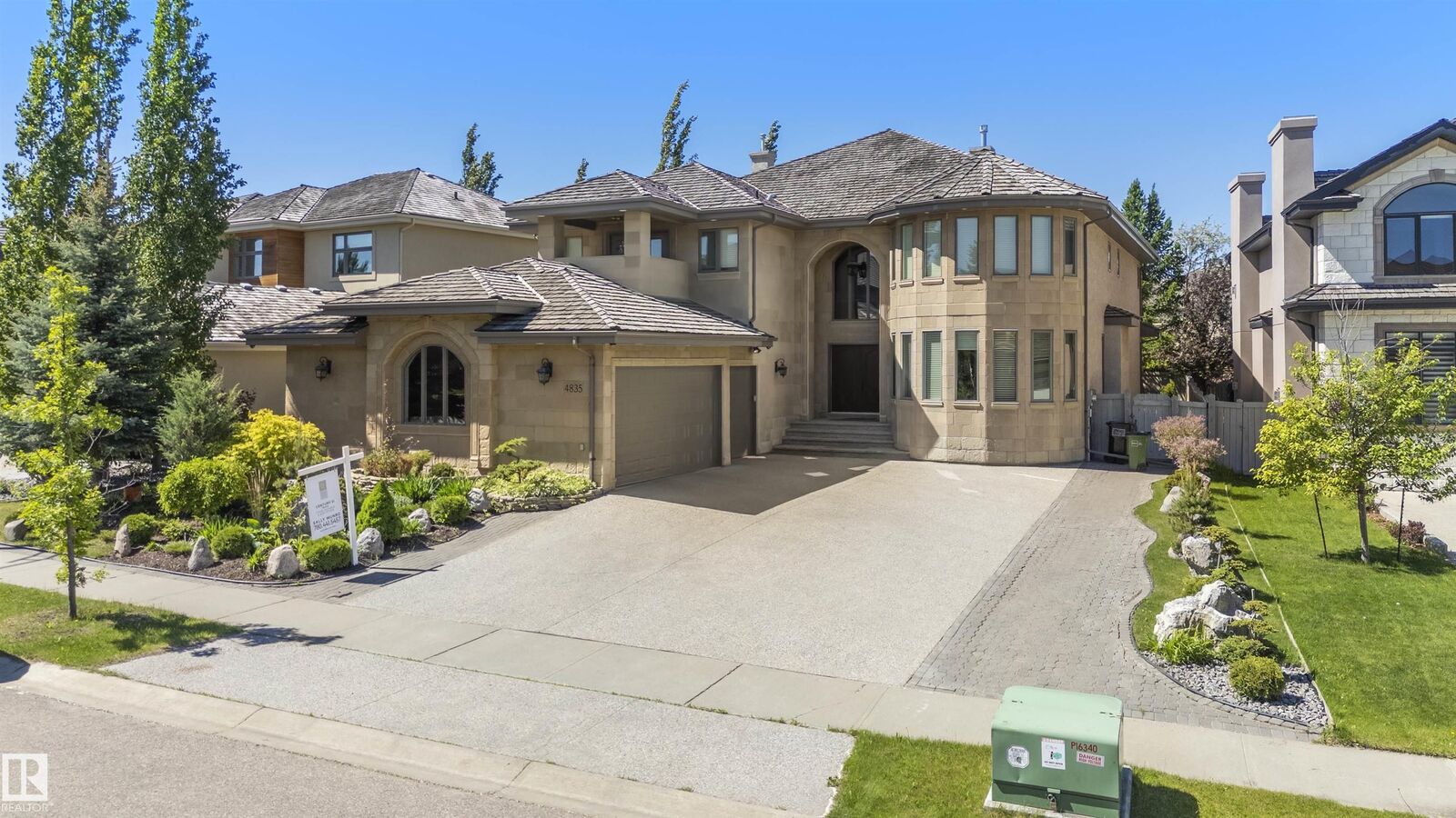 Property Photo:  4835 Mactaggart Crest Crest NW  AB T6R 3G5 