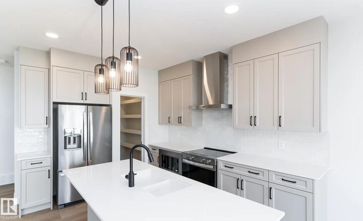 Property Photo: 3218 Dixon Way SW AB T6W 5L3
