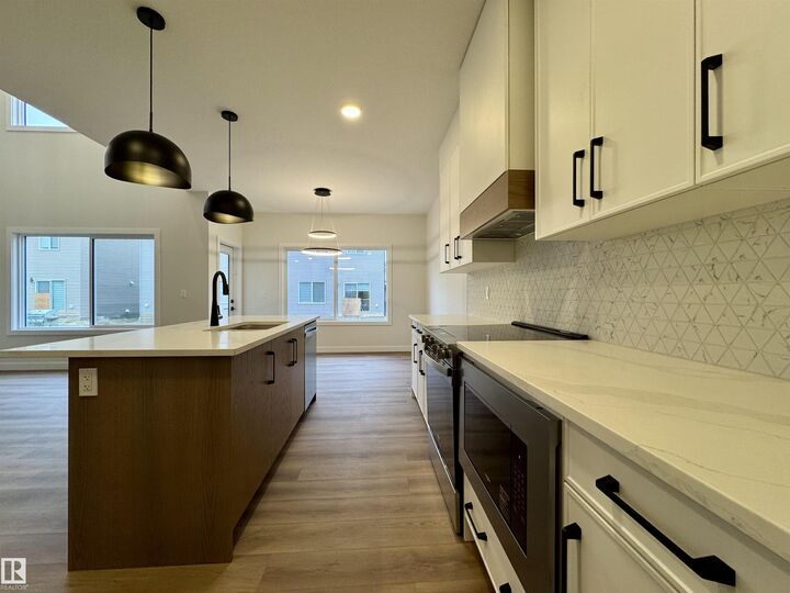 Property Photo: 3218 Dixon Way SW AB T6W 5L3