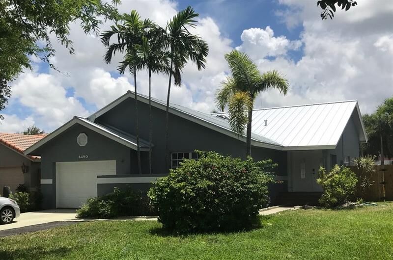 Property Photo:  6490 SW 13th St  FL 33317