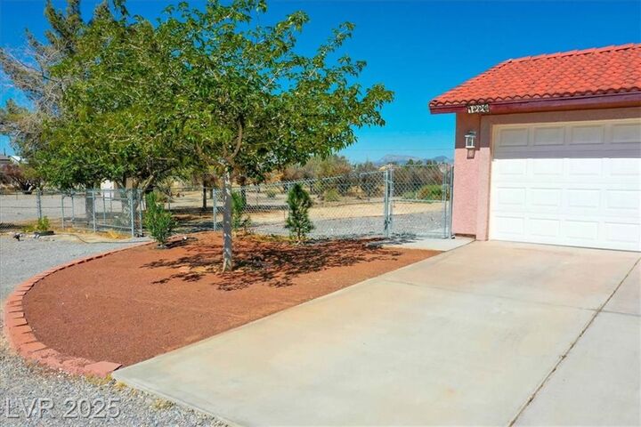 Property Photo:  1220 East Gamebird Road  NV 89048 
