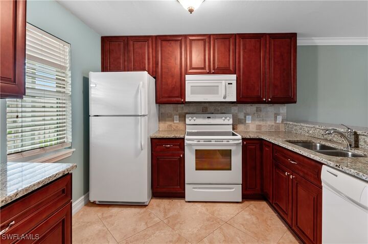 829 W Elkcam Circle 2-208  Marco Island FL 34145 photo