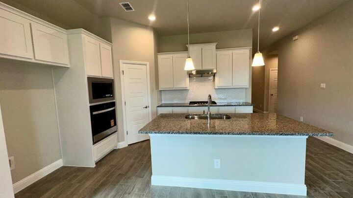 Property Photo:  2617 McCormick Street  TX 76205 