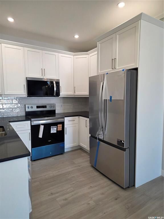 Property Photo:  846 Delaet Bay  SK S0K 0A1 
